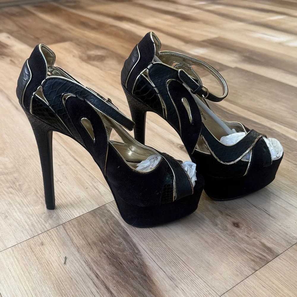 bebe Clarissa Black and Gold Platform High Heel Sandals